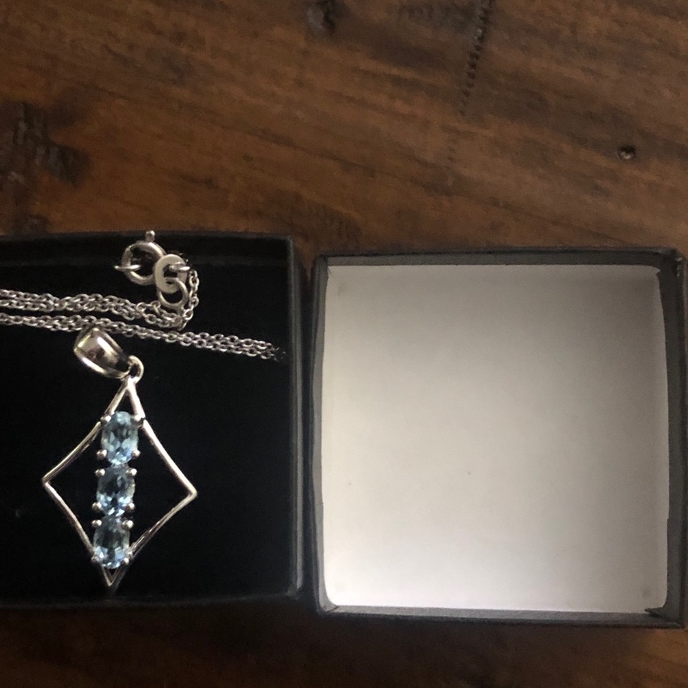 Beautiful woman’s sterling silver / Topaz